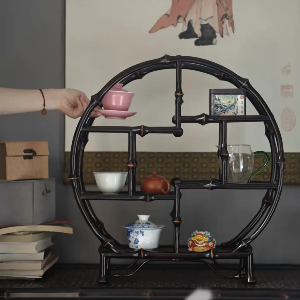 Round Bamboo Curio Shelf in Dark Lacquer — front view