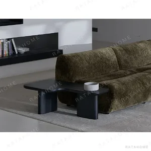 Bamboo Joint Sofa Arm Table in Black Organic Form — in a room setting