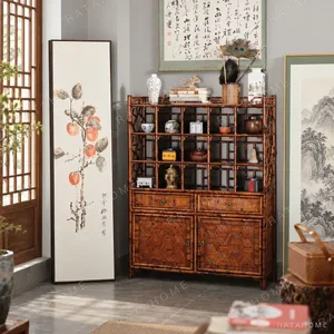 Bamboo Curio Bookcase in clay — in a room setting