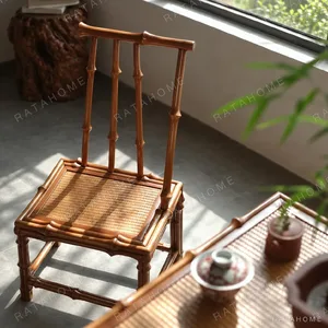Bamboo Woven Small Side Chair with Slanted Back in natural oak — in a room setting