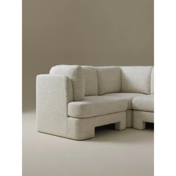 Banna Modular Sofa in Oatmeal Wool Bouclé with Ottoman — in a room setting