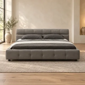 Grey Bed with Tufted Base and Pillow Headboard in slate — front view