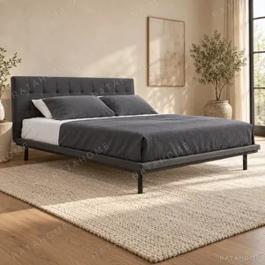 Charcoal Grid-Tufted Headboard Bed on Metal Legs in slate — in a room setting