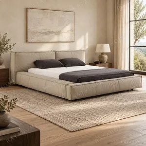 Greige Low Bed with Wide Cushion Headboard in sand — in a room setting