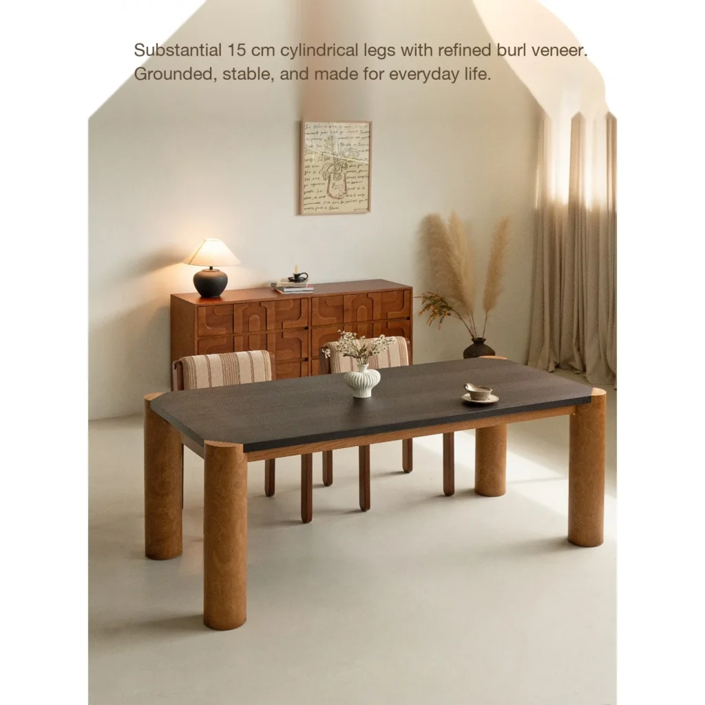 Bedrock Dining Table with Dark Top and Burl Cylinder Legs in black — front view
