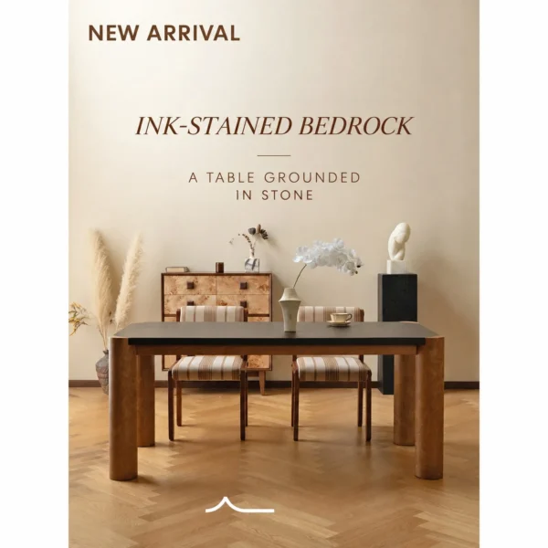 Bedrock Dining Table with Dark Top and Burl Cylinder Legs in black — in a room setting