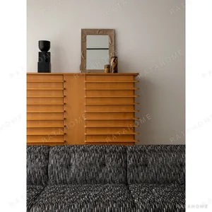Beethoven Louvred Curved-Front Tall Cabinet in natural oak — in a room setting