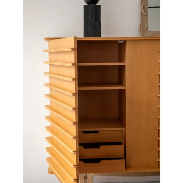 Beethoven Louvred Curved-Front Tall Cabinet in natural oak — in a room setting