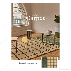 Beige Grid Rug with Green Colour Block in sand — in a room setting
