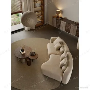 Bessel Couture Curved Sofa in Apricot Textured Fabric — in a room setting