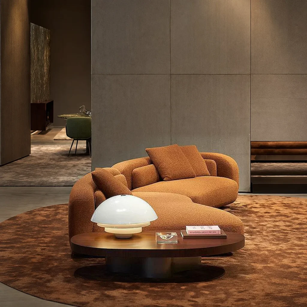 Curved Sofa Ruen in performance fabric — front view