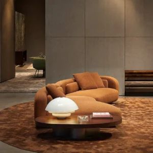 Curved Sofa Ruen in performance fabric — front view