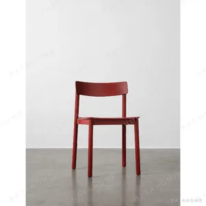 Betty Red Ash Dining Chair in red — in a room setting