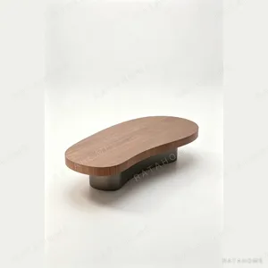 Curved Walnut Coffee Table in walnut — in a room setting