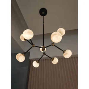 Black Branch Stone Globe Round Chandelier, 9 or 12 Lights in black — in a room setting