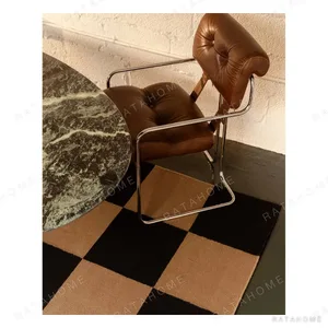 Black and Camel Checkerboard Rug in black — in a room setting