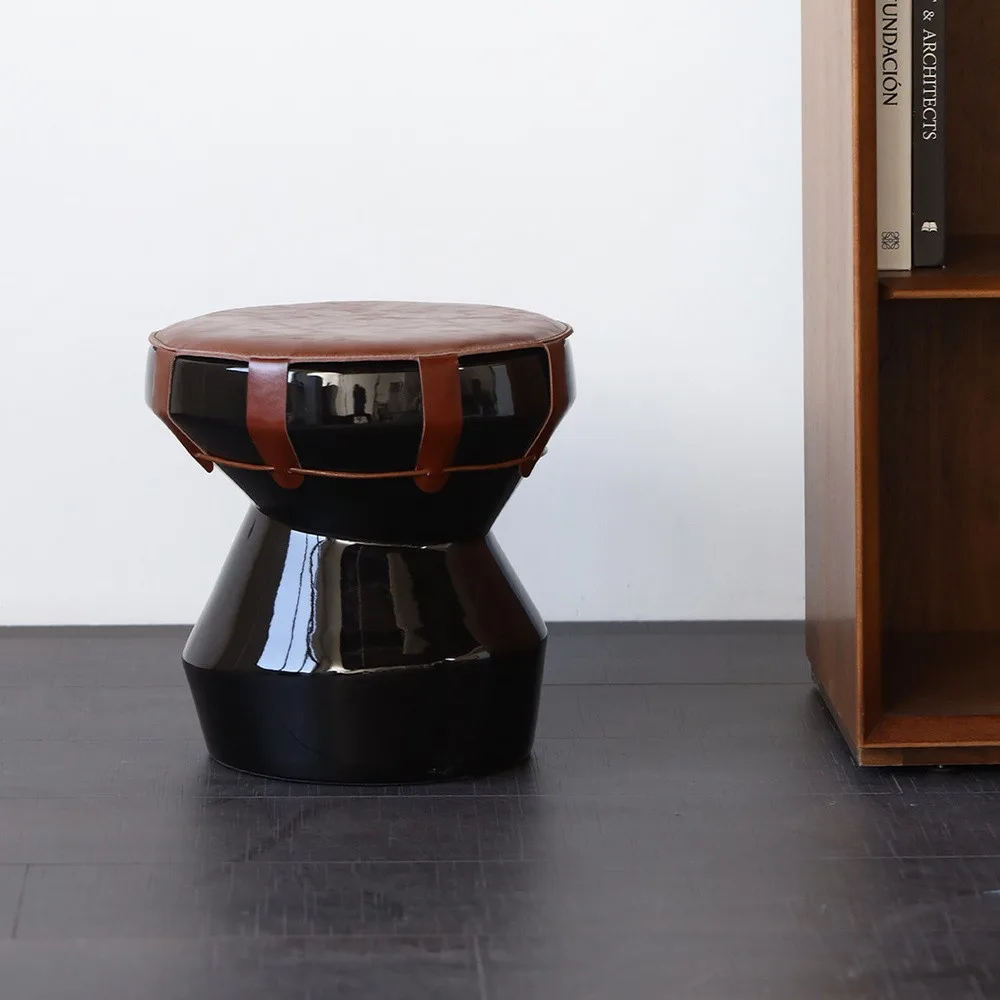 Black Glazed Drum Stool with Tan Leather Straps in black — front view