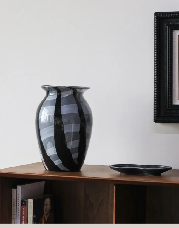 Black and Grey Brushed Stripe Glass Vase in black — in a room setting