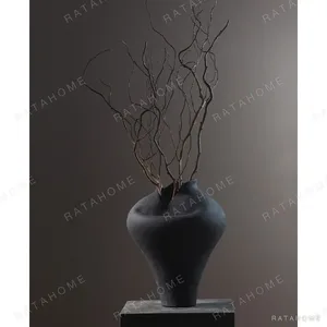 Jingdezhen Black Pinched-Rim Ceramic Jar Vase, Medium in black — in a room setting