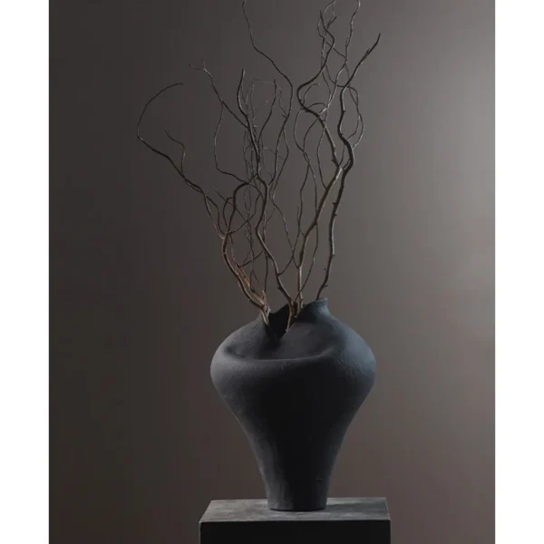 Jingdezhen Black Pinched-Rim Ceramic Jar Vase, Medium in black — in a room setting