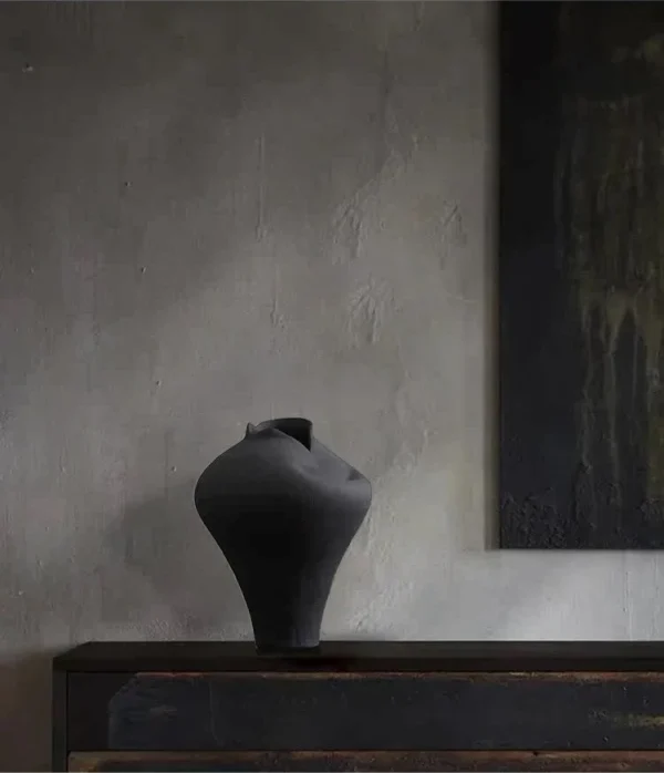 Jingdezhen Black Pinched-Rim Ceramic Jar Vase, Medium in black — in a room setting