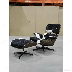 Black Leather Mid Century Lounge Chair in full-grain leather — in a room setting