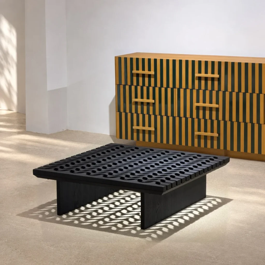 Black Solid Wood Coffee Table with Pierced Wave Top in black — front view