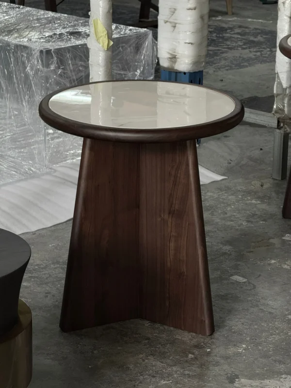 Black Walnut Side Table with Round Marble Top on Folded Base in walnut — in a room setting