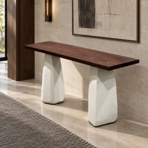 Black Walnut Long Table on Faceted Microcement Bases in walnut — front view