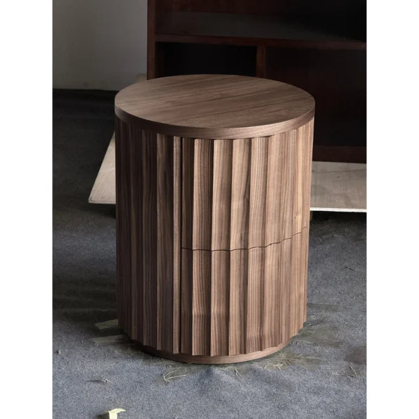 Black Walnut Fluted Drum Nightstand in walnut — in a room setting