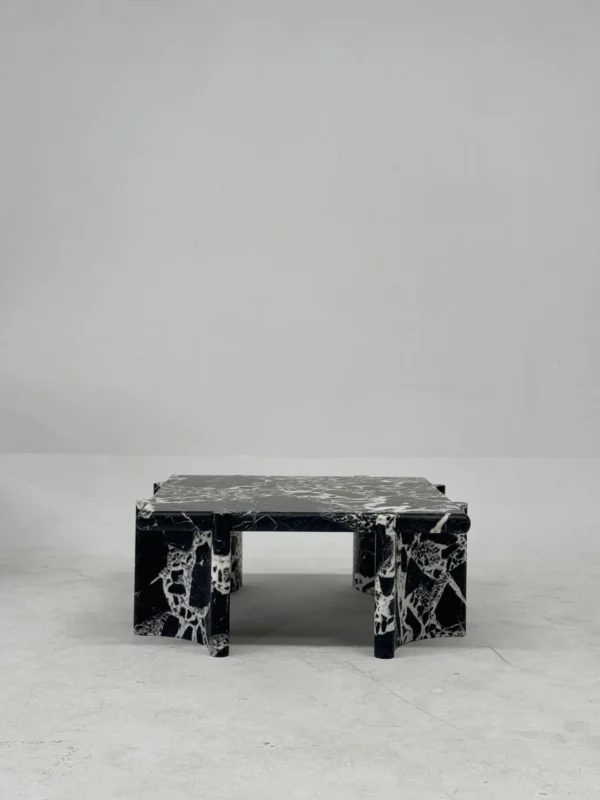 Black and White Breccia Marble Coffee Table in black — in a room setting