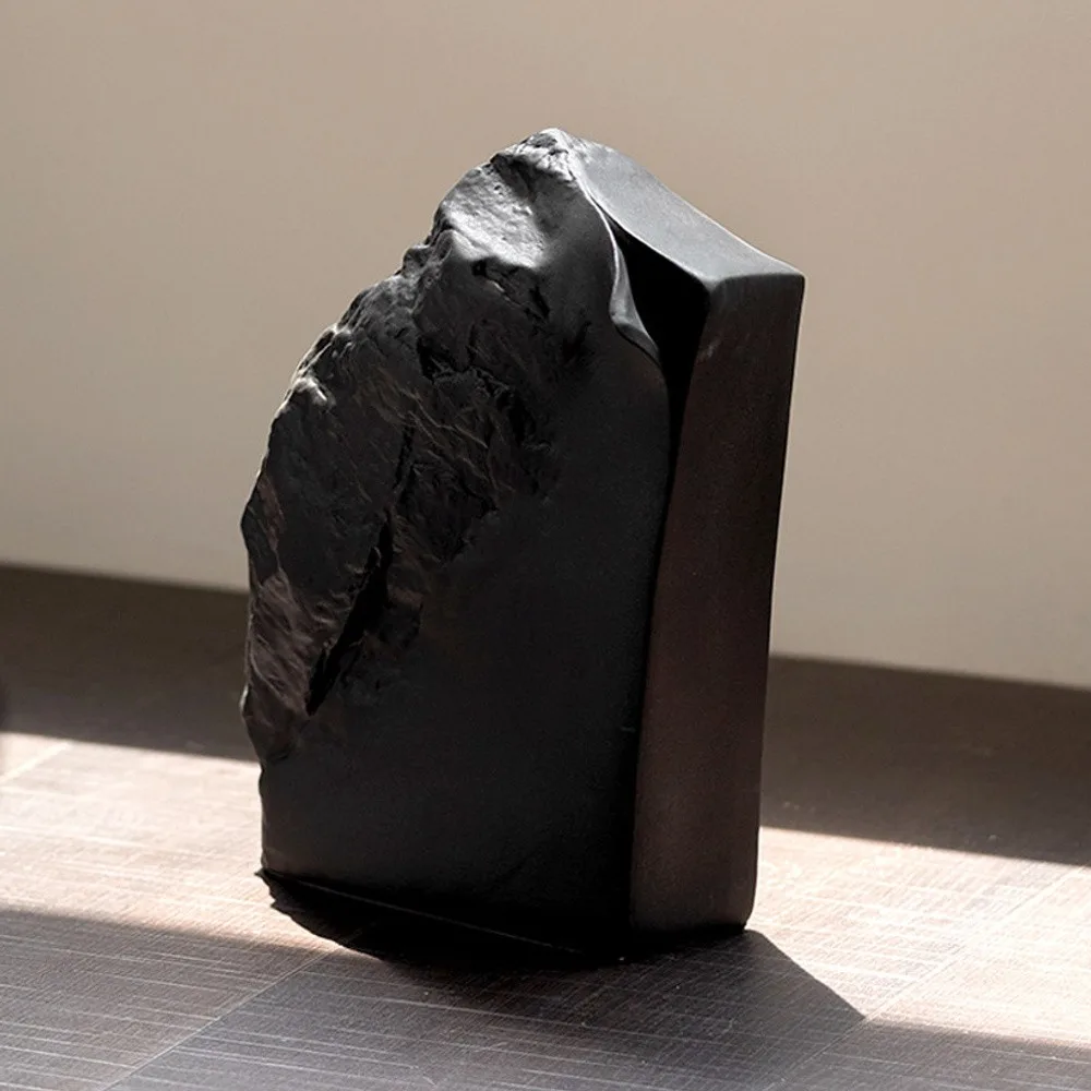 Black Rock Texture Ceramic Sculpture Vase in black — front view