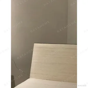 Black Wood Frame Slipper Chair in Plain Cream Fabric — in a room setting