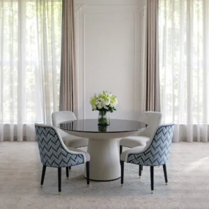 Beech Marquetry Round Table with Blue Jacquard Dining Chairs in natural oak — front view