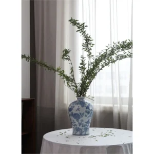 Hand-Painted Blue and White Flower and Bird Plum Vase in blue — in a room setting