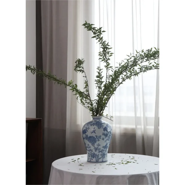 Hand-Painted Blue and White Flower and Bird Plum Vase in blue — in a room setting