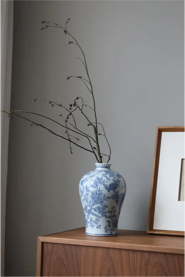Hand-Painted Blue and White Flower and Bird Plum Vase in blue — in a room setting