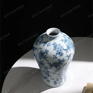 Hand-Painted Blue and White Flower and Bird Plum Vase in blue — in a room setting