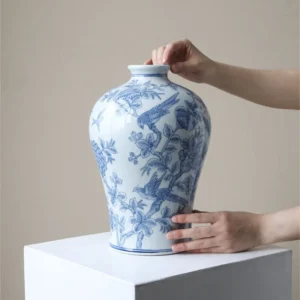 Hand-Painted Blue and White Flower and Bird Plum Vase in blue — in a room setting
