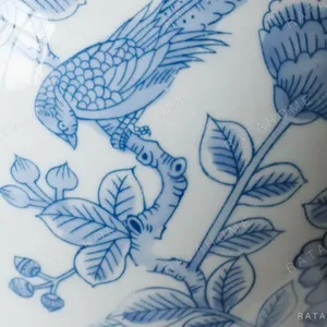 Hand-Painted Blue and White Flower and Bird Plum Vase in blue — in a room setting