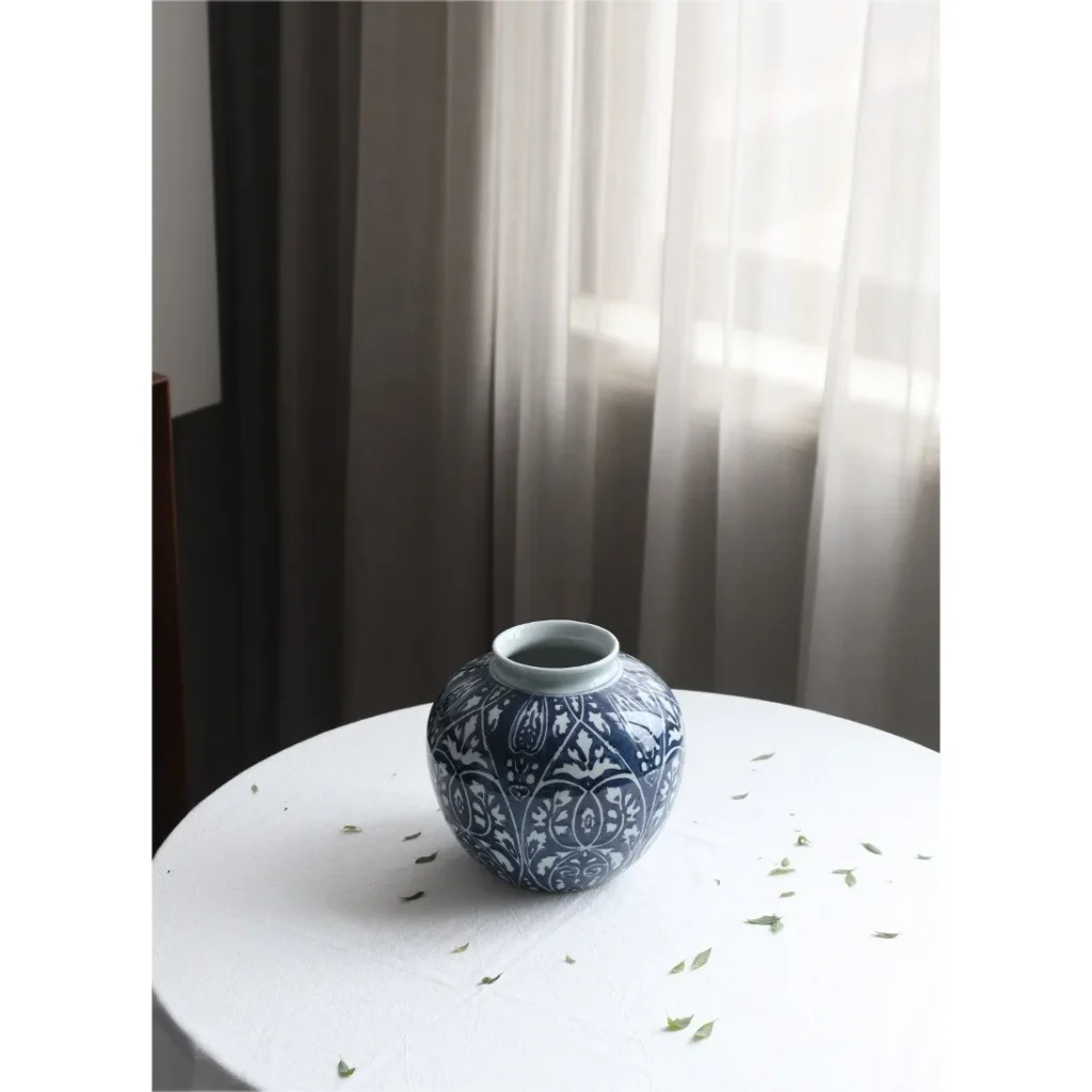 Hand-Painted Blue and White Ethnic Pattern Apple Jar, Medium in blue — in a room setting