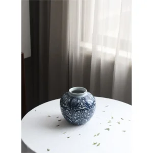 Hand-Painted Blue and White Ethnic Pattern Apple Jar, Medium in blue — in a room setting