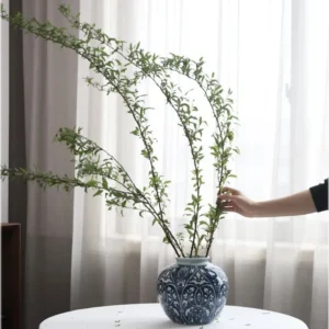 Hand-Painted Blue and White Ethnic Pattern Apple Jar, Medium in blue — in a room setting