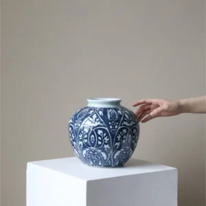 Hand-Painted Blue and White Ethnic Pattern Apple Jar, Medium in blue — in a room setting
