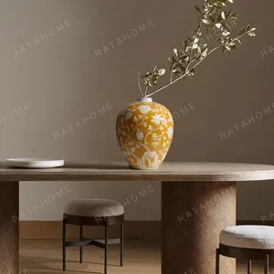Yellow Ground Blue-and-White Style Floral Ceramic Vase in mustard — in a room setting