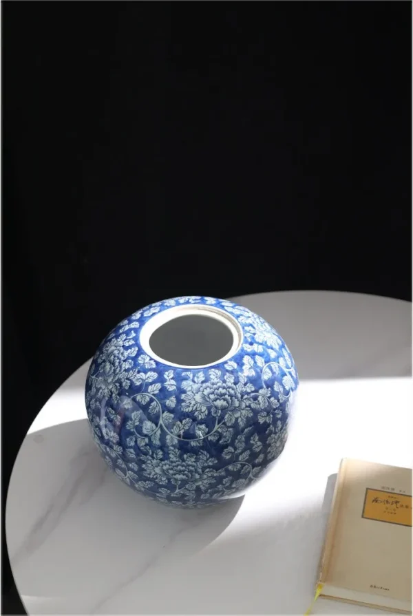 Hand-Painted Blue Ground Floral Lidded Jar, Large in blue — in a room setting