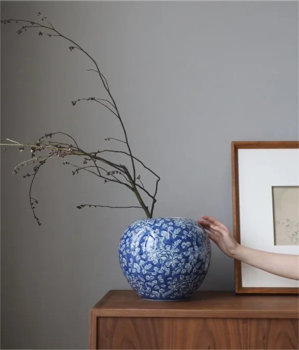 Hand-Painted Blue Ground Floral Lidded Jar, Large in blue — in a room setting