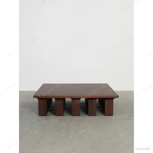 Oak Low Coffee Table on Multiple Block Legs, 120 x 130 cm in clay — in a room setting