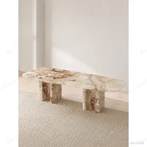 Breccia Marble Long Dining Table on Stone Slabs in rust — in a room setting