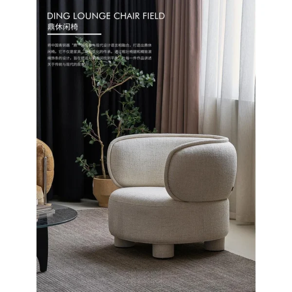 Ding Bronze-Inspired Round Armchair in Grey Bouclé — in a room setting